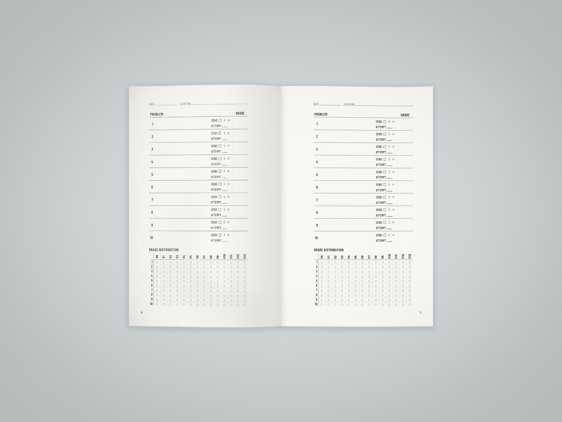 Inside spread of the Bouldering Log Book showing the V-scale grade tracking system